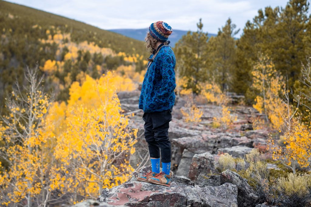 Hiker in the Mountains wearing Bluebird Magic Socks