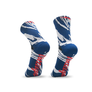 a pair of voltage blue and white socks with a marbled design